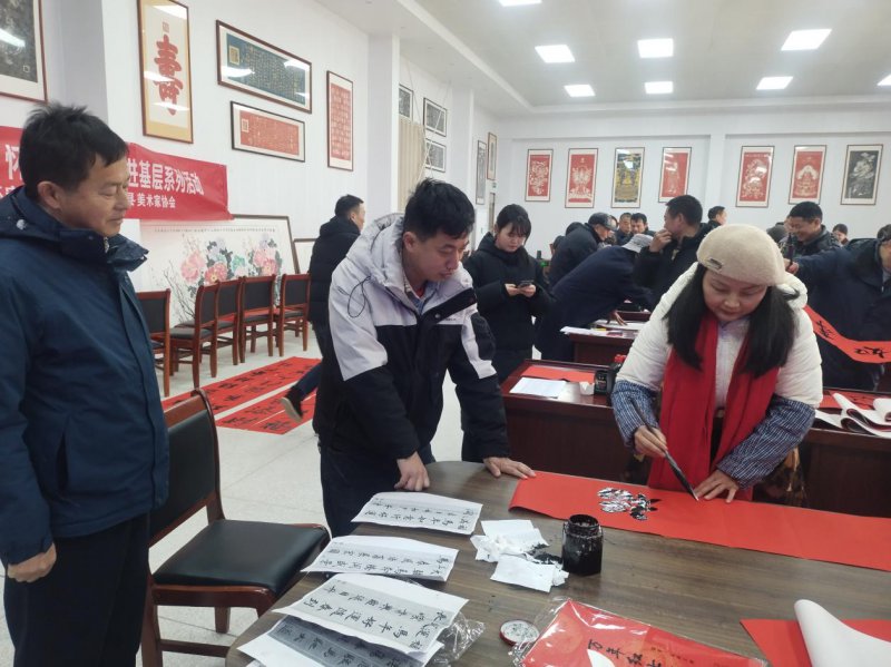 翰墨迎春送万福 文化润心暖千家